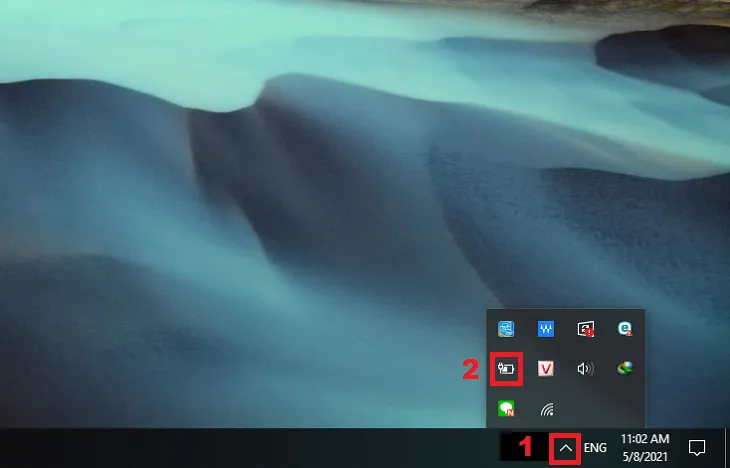 Kéo biểu tượng pin từ vùng ẩn ra taskbar chính