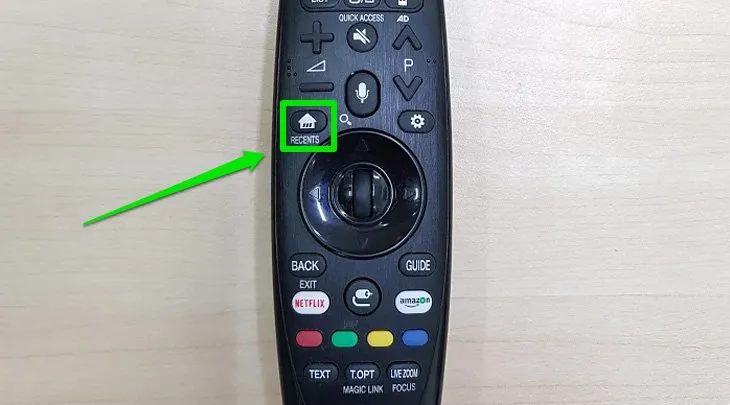 Nhấn nút Home trên remote tivi LG