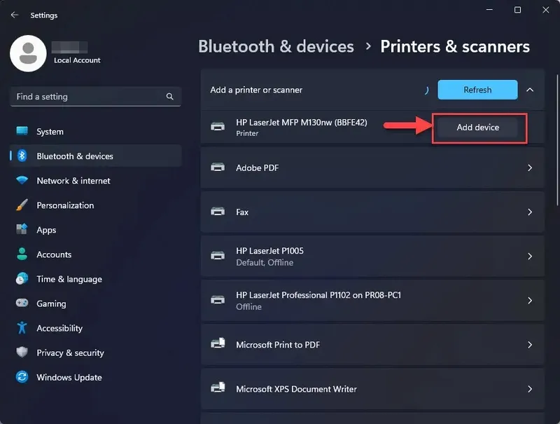 Mở Settings và chọn Printers & scanners