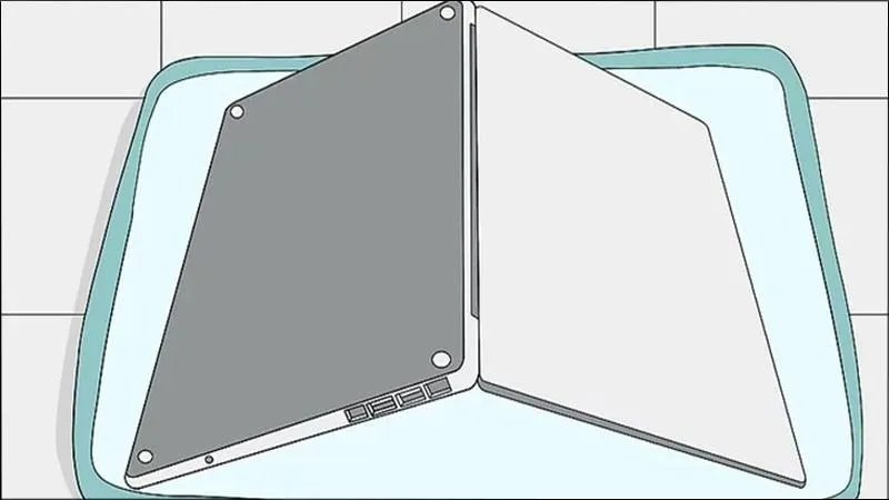 Äáº·t máy náº±m úp xuá»‘ng dÆ°á»›i Ä‘á»ƒ làm thoát pháº§n nÆ°á»›c tích tá»¥ bên trong