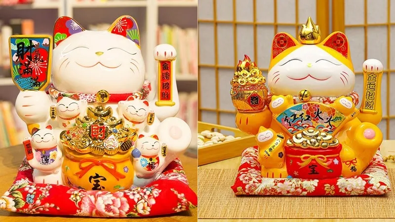 Mèo giữ đồng tiền vàng